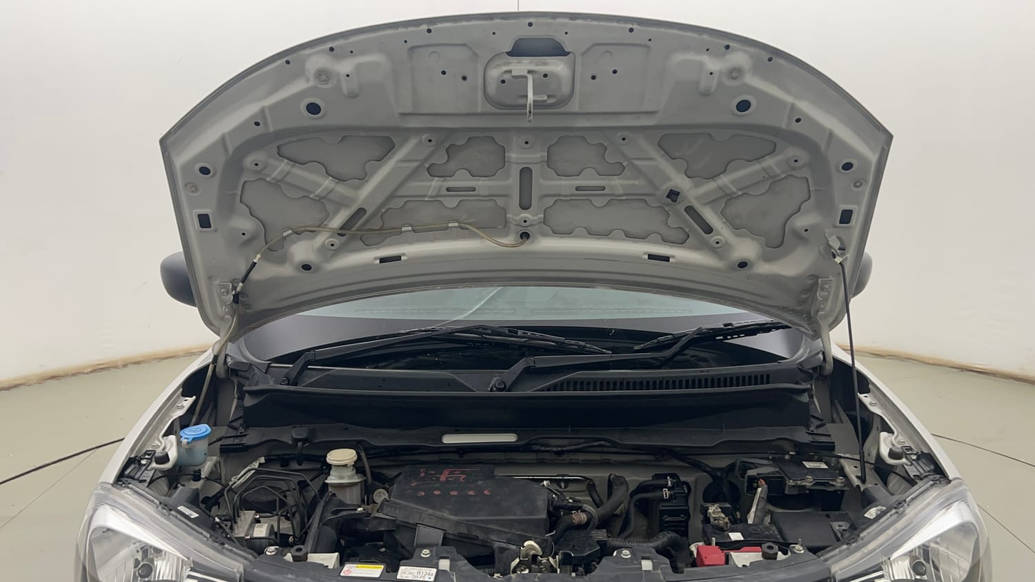 Used 2023 Maruti Suzuki S-Presso VXi Petrol Manual engine ENGINE & BONNET OPEN FRONT VIEW