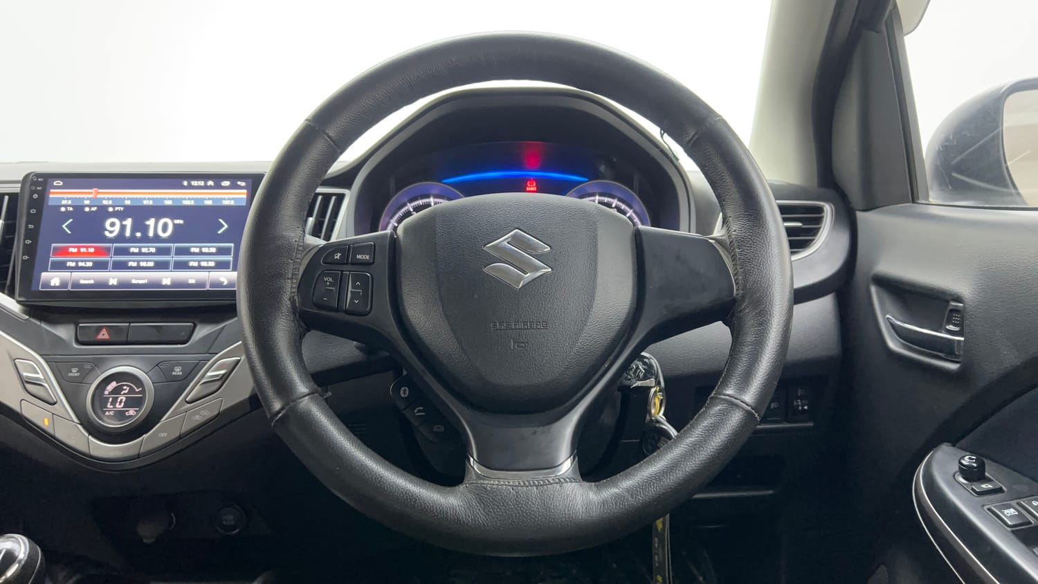 Used 2021 Maruti Suzuki Baleno Delta Petrol Manual interior STEERING VIEW