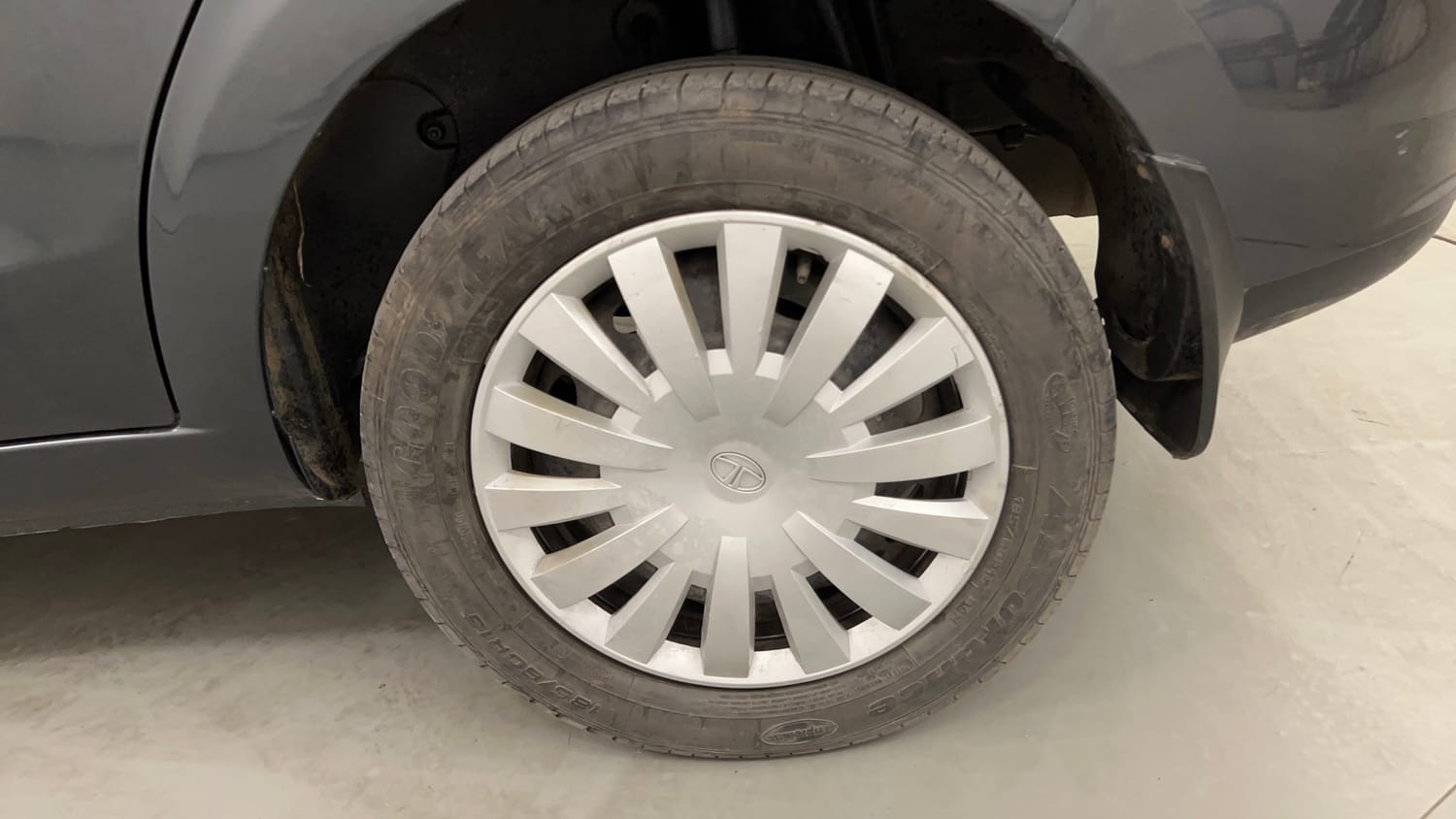Used 2015 Tata Zest XMS Petrol Petrol Manual tyres LEFT REAR TYRE RIM VIEW