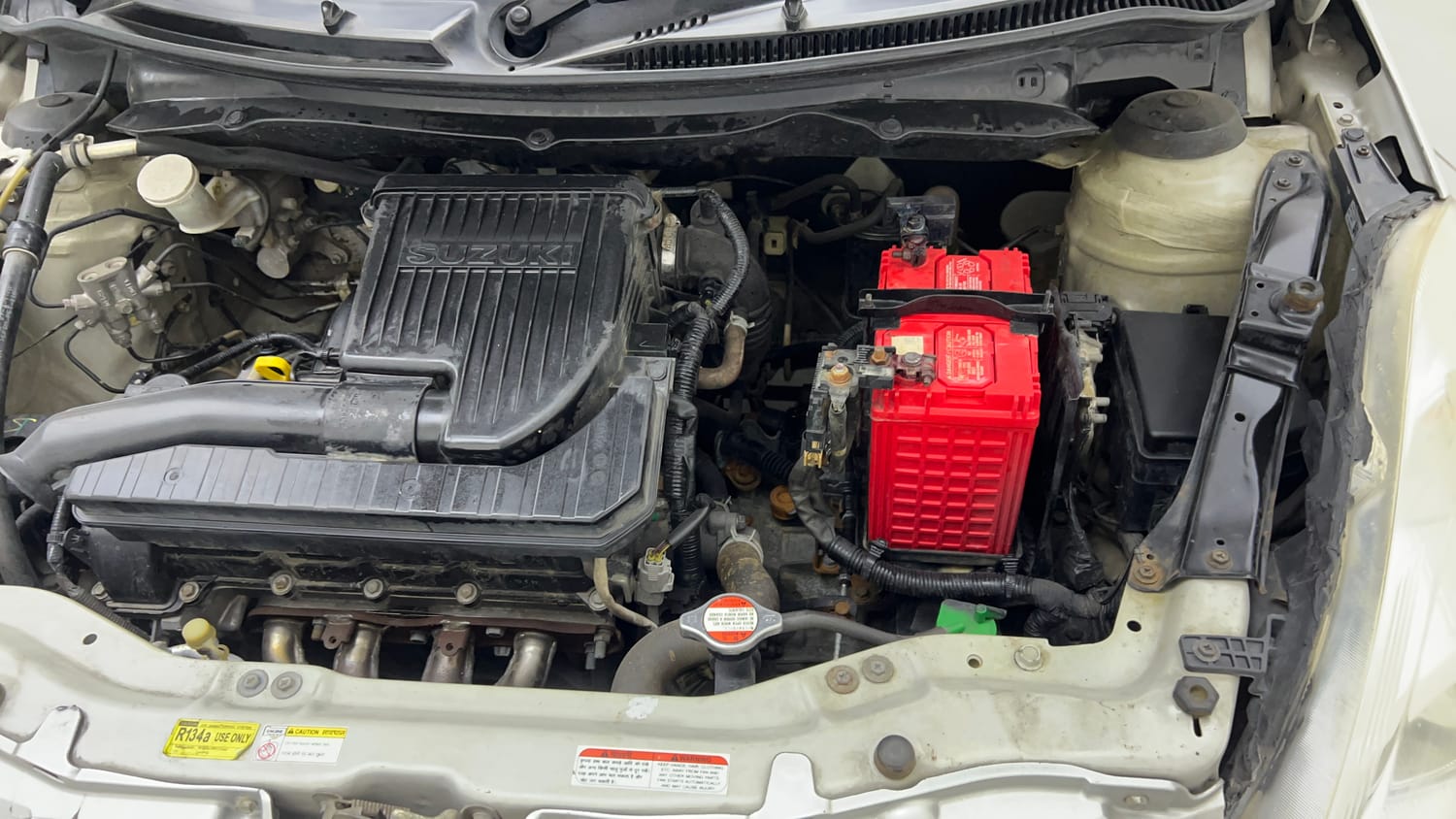 Used 2017 Maruti Suzuki Swift Lxi (O) Petrol Manual engine ENGINE LEFT SIDE VIEW