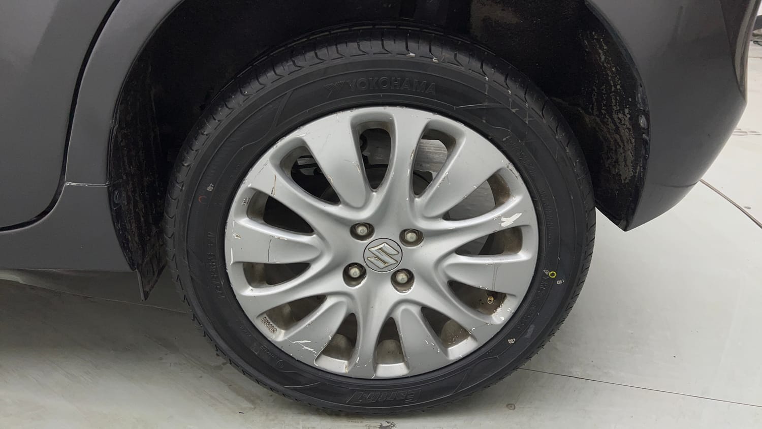 Used 2018 Maruti Suzuki Baleno Zeta 1.2 Petrol Manual tyres LEFT REAR TYRE RIM VIEW
