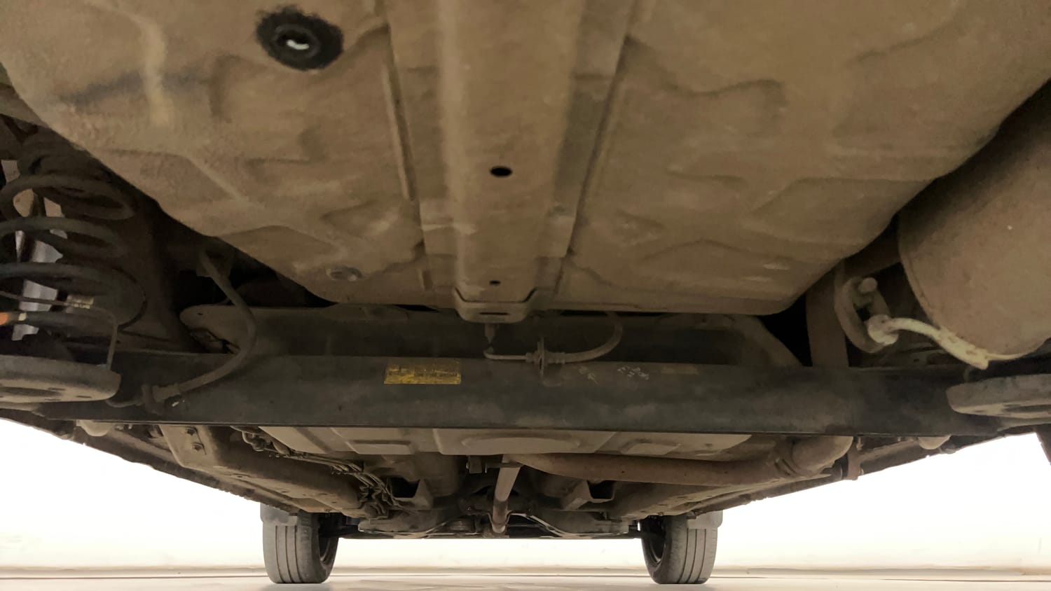 Used 2015 Tata Zest XMS Petrol Petrol Manual extra REAR UNDERBODY VIEW (TAKEN FROM REAR)