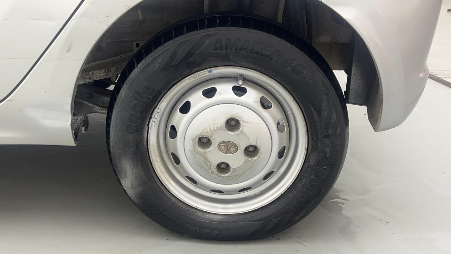 Used 2017 Tata Tiago Revotron XM Petrol Manual tyres LEFT REAR TYRE RIM VIEW