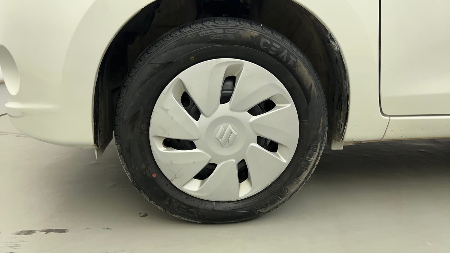 Used 2015 Maruti Suzuki Celerio VXi AMT Petrol Automatic tyres LEFT FRONT TYRE RIM VIEW