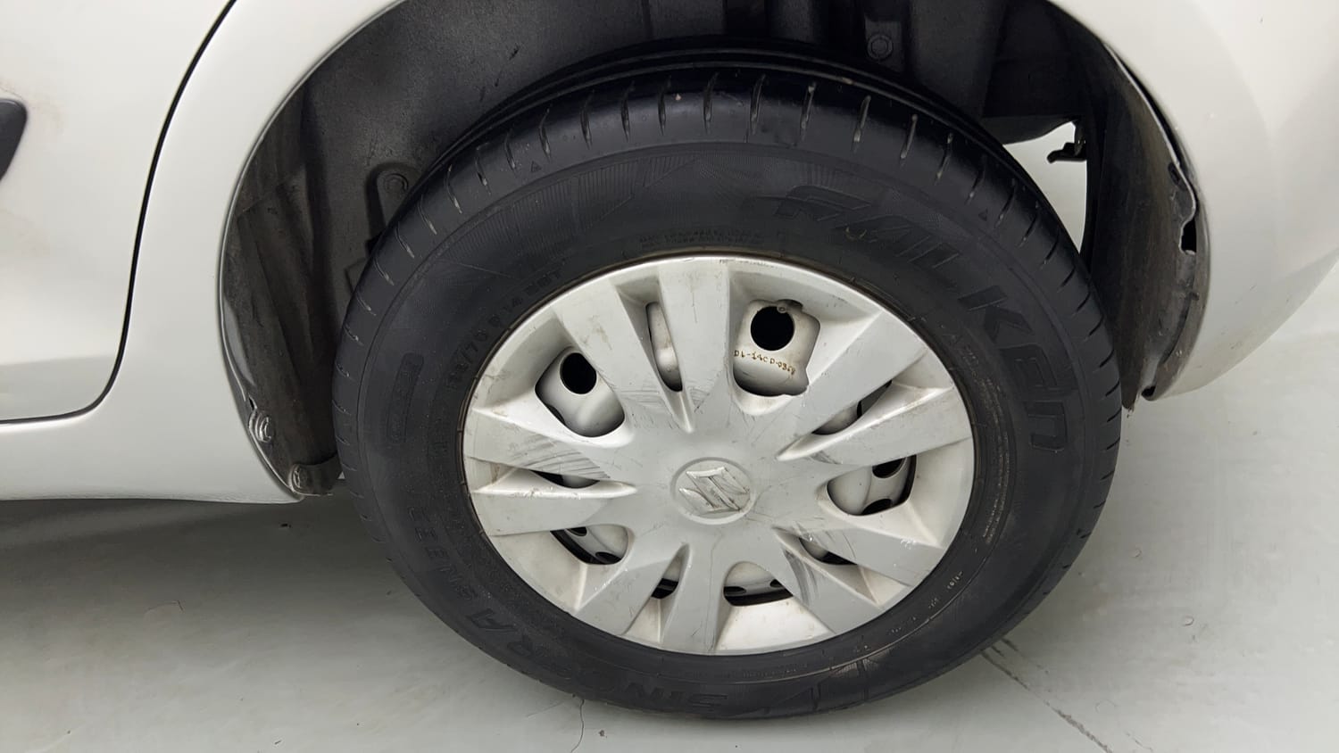 Used 2017 Maruti Suzuki Swift Lxi (O) Petrol Manual tyres LEFT REAR TYRE RIM VIEW