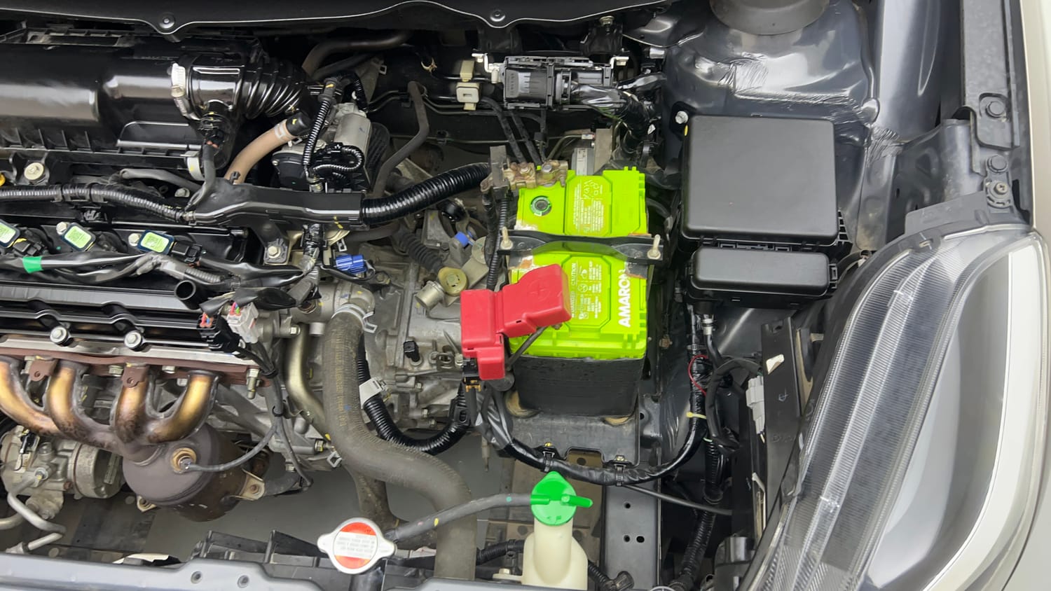 Used 2021 Maruti Suzuki Baleno Delta Petrol Manual engine ENGINE LEFT SIDE VIEW