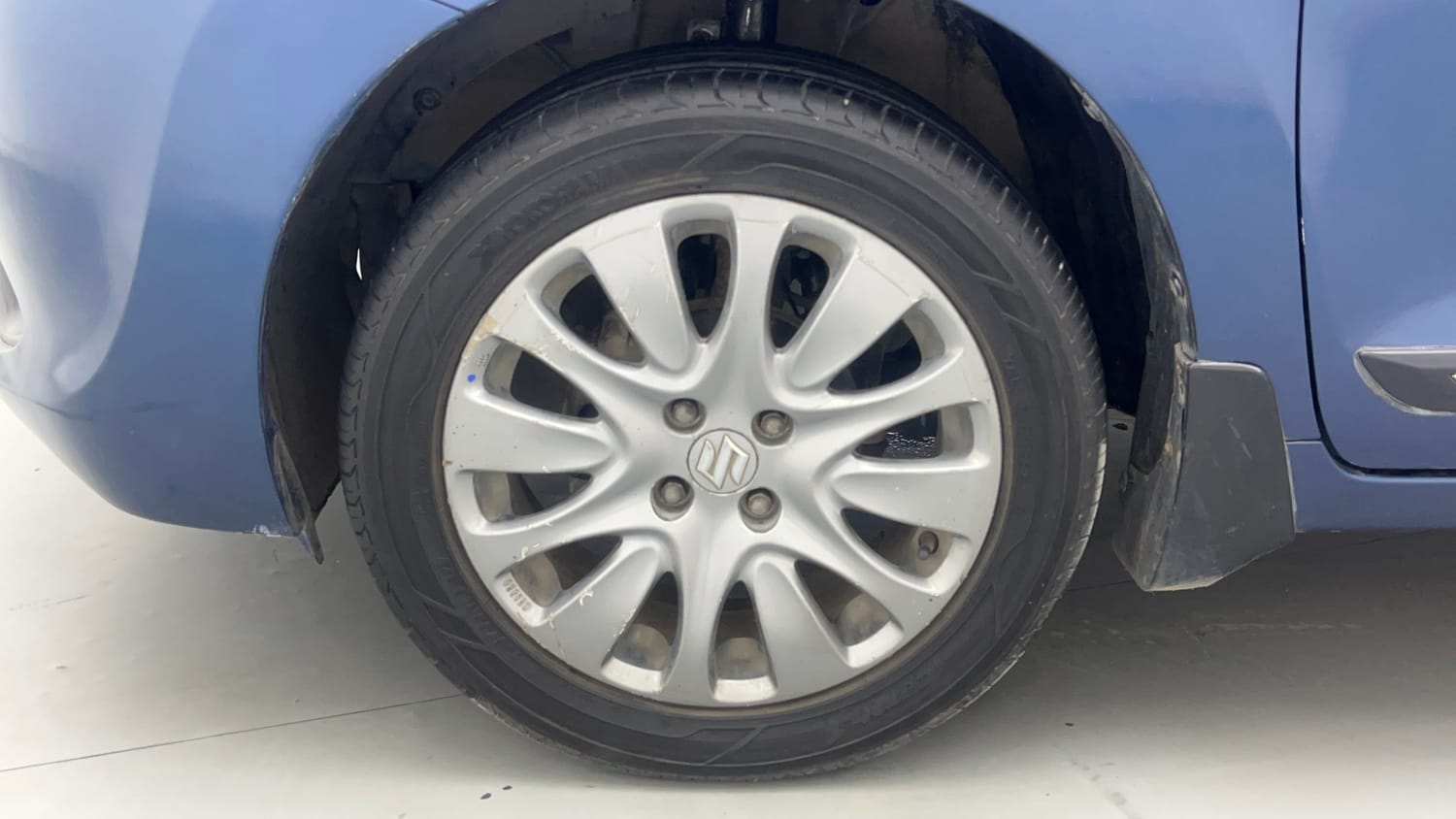 Used 2018 Maruti Suzuki Baleno Zeta 1.2 Petrol Manual tyres LEFT FRONT TYRE RIM VIEW