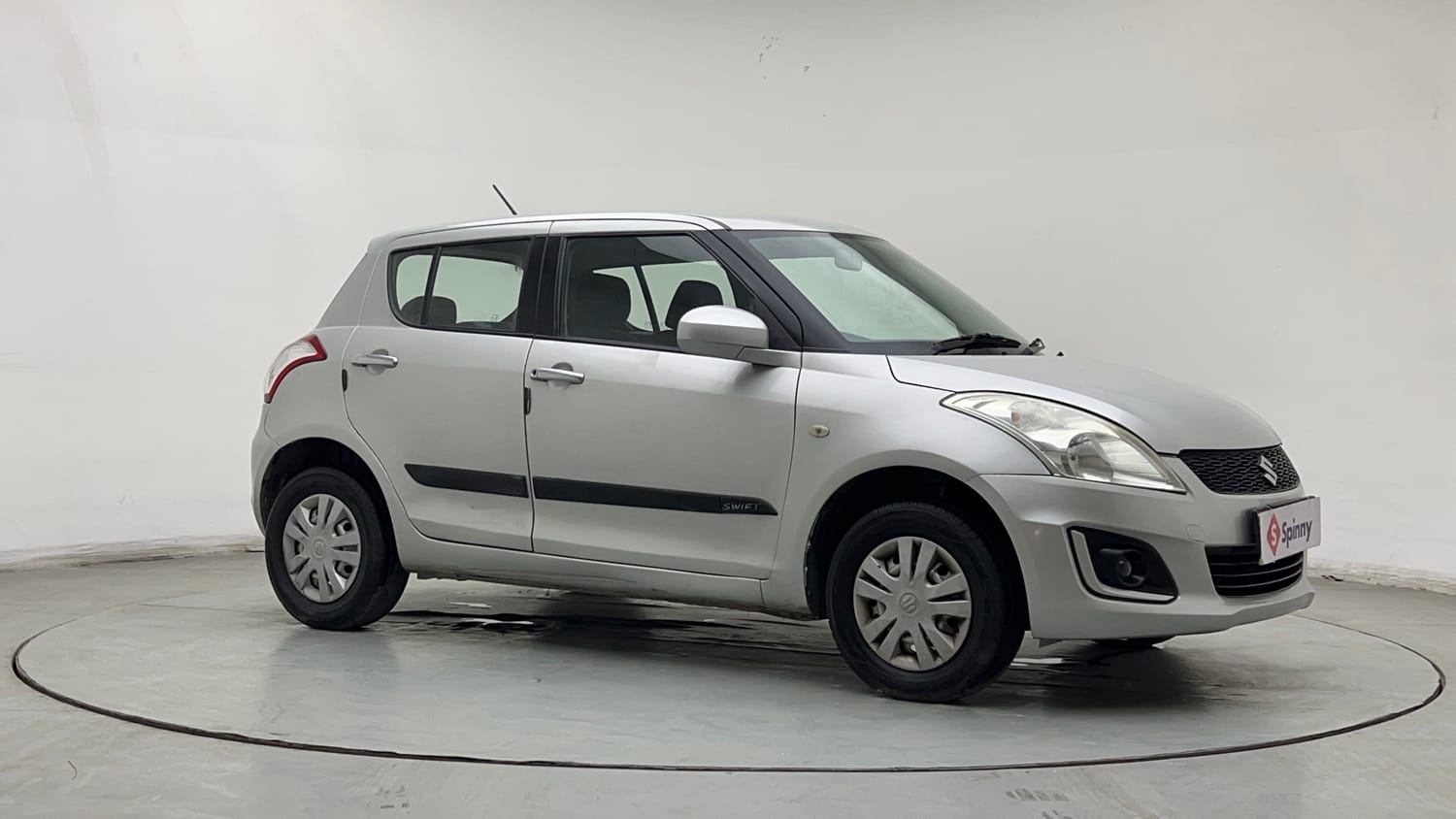 Used 2017 Maruti Suzuki Swift Lxi (O) Petrol Manual exterior RIGHT FRONT CORNER VIEW