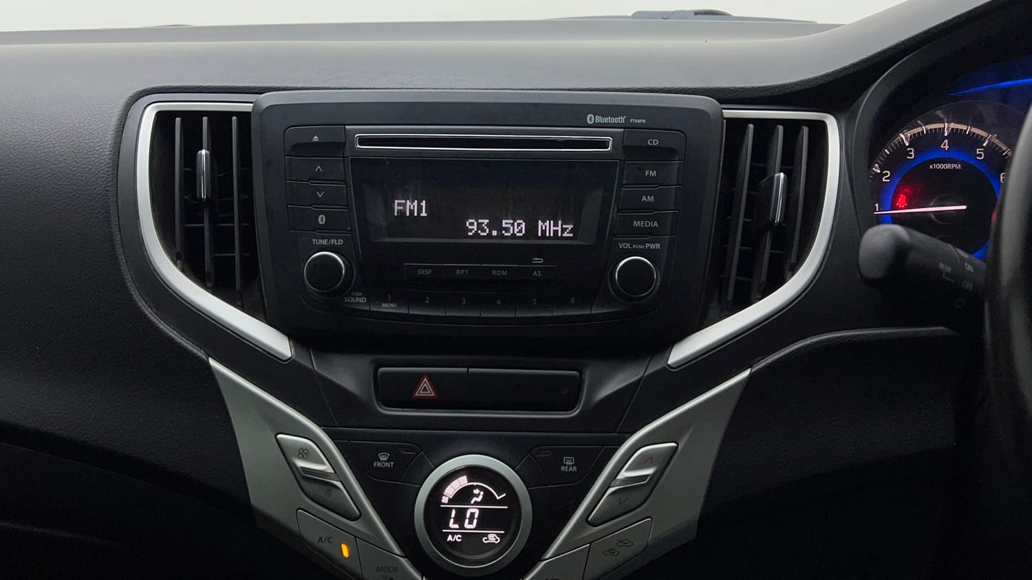 Used 2018 Maruti Suzuki Baleno Zeta 1.2 Petrol Manual top_features Integrated (in-dash) music system
