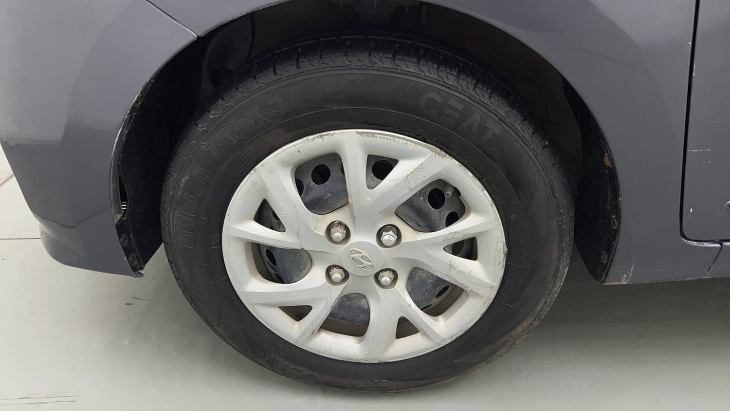 Used 2019 Hyundai Grand i10 Magna 1.2 Kappa VTVT Petrol Manual tyres LEFT FRONT TYRE RIM VIEW