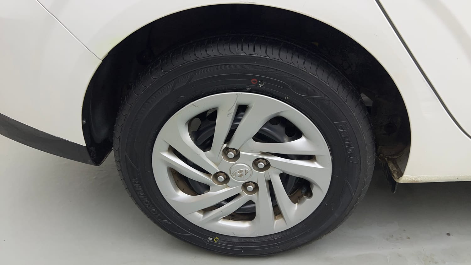 Used 2022 Hyundai Aura S 1.2 Petrol Petrol Manual tyres RIGHT REAR TYRE RIM VIEW