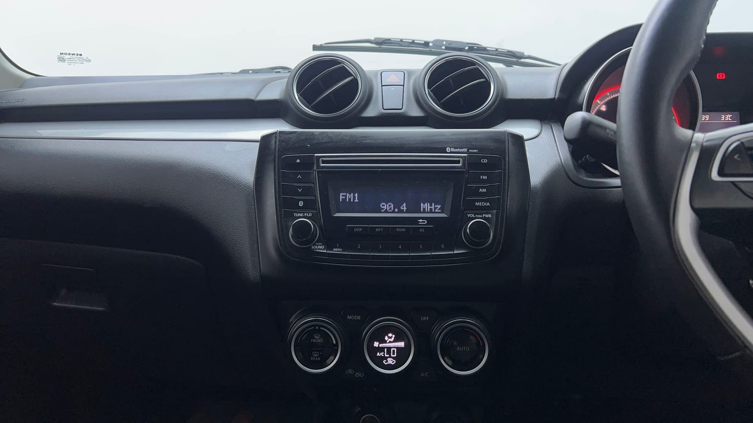 Used 2019 Maruti Suzuki Swift ZXi Petrol Manual top_features Integrated (in-dash) music system