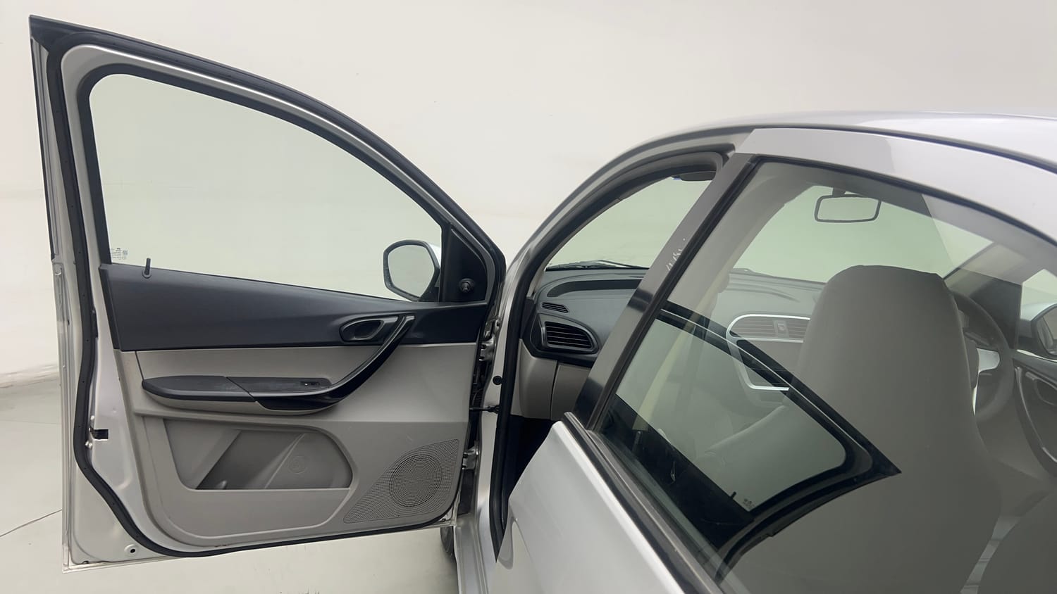 Used 2017 Tata Tiago Revotron XM Petrol Manual interior LEFT FRONT DOOR OPEN VIEW