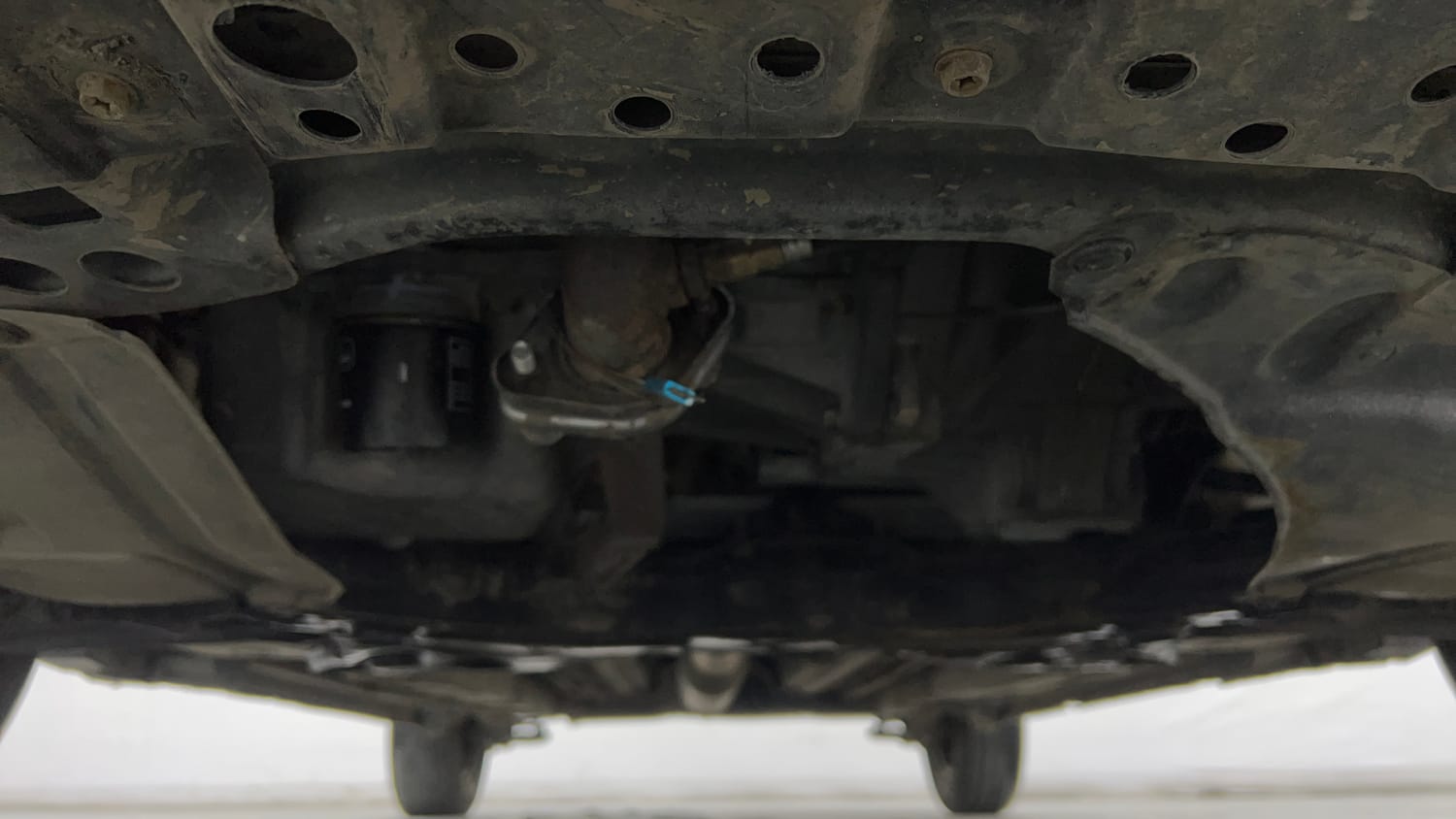 Used 2017 Maruti Suzuki Swift Lxi (O) Petrol Manual extra FRONT LEFT UNDERBODY VIEW