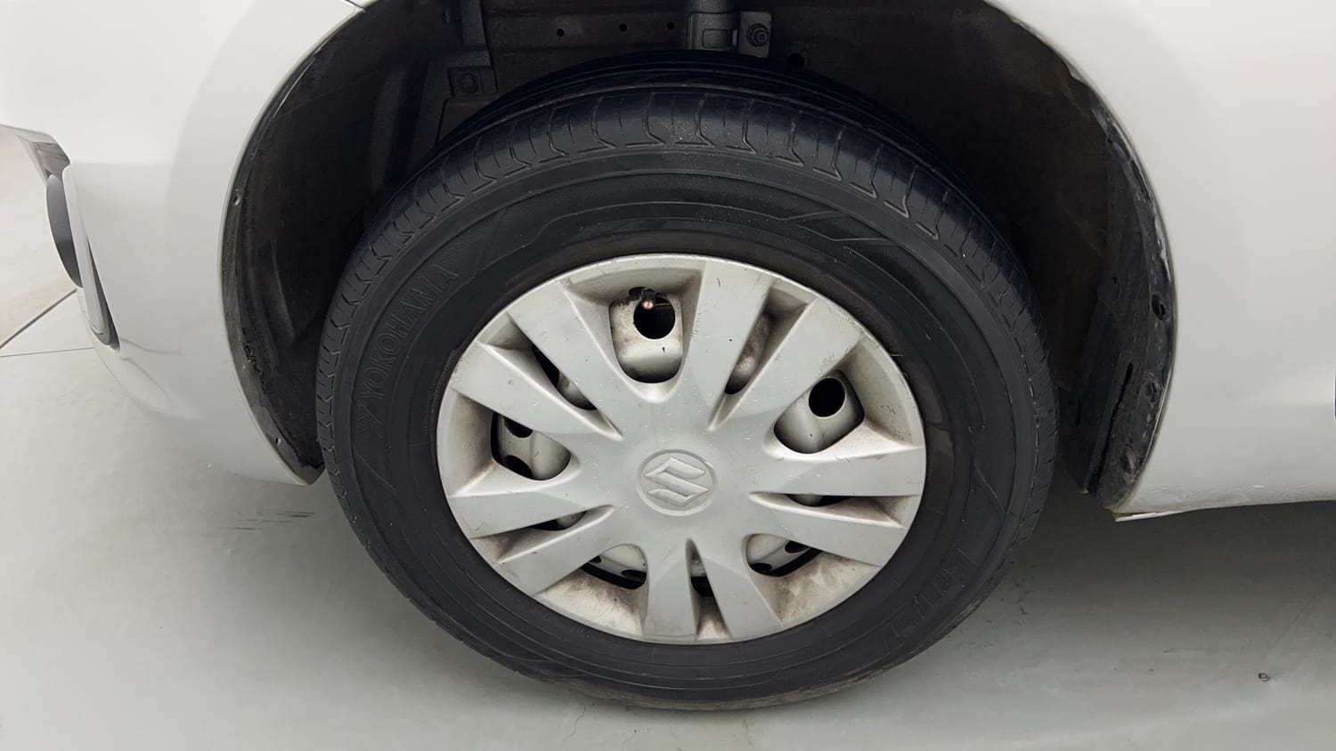 Used 2017 Maruti Suzuki Swift Lxi (O) Petrol Manual tyres LEFT FRONT TYRE RIM VIEW