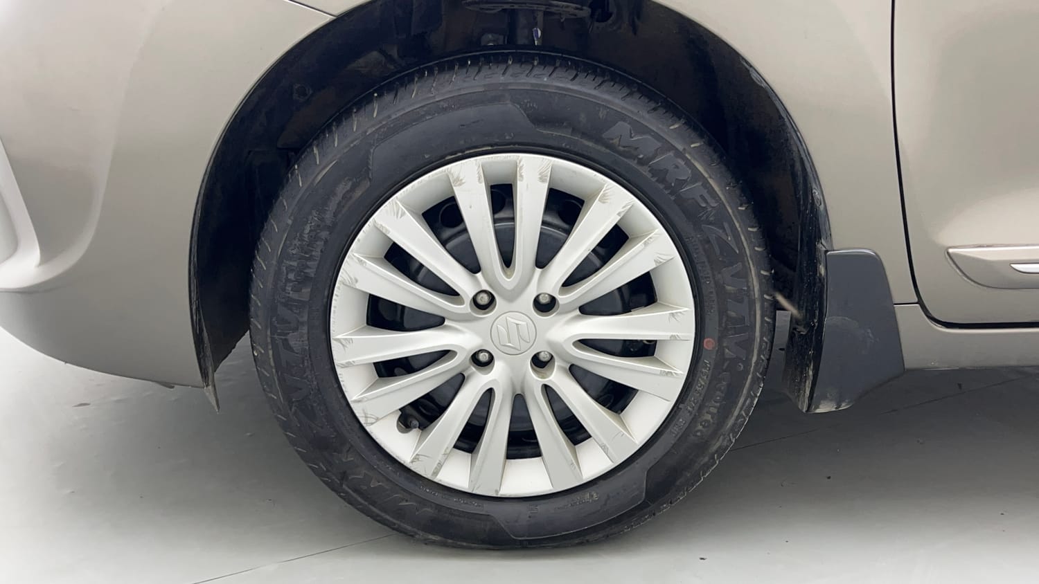Used 2021 Maruti Suzuki Baleno Delta Petrol Manual tyres LEFT FRONT TYRE RIM VIEW