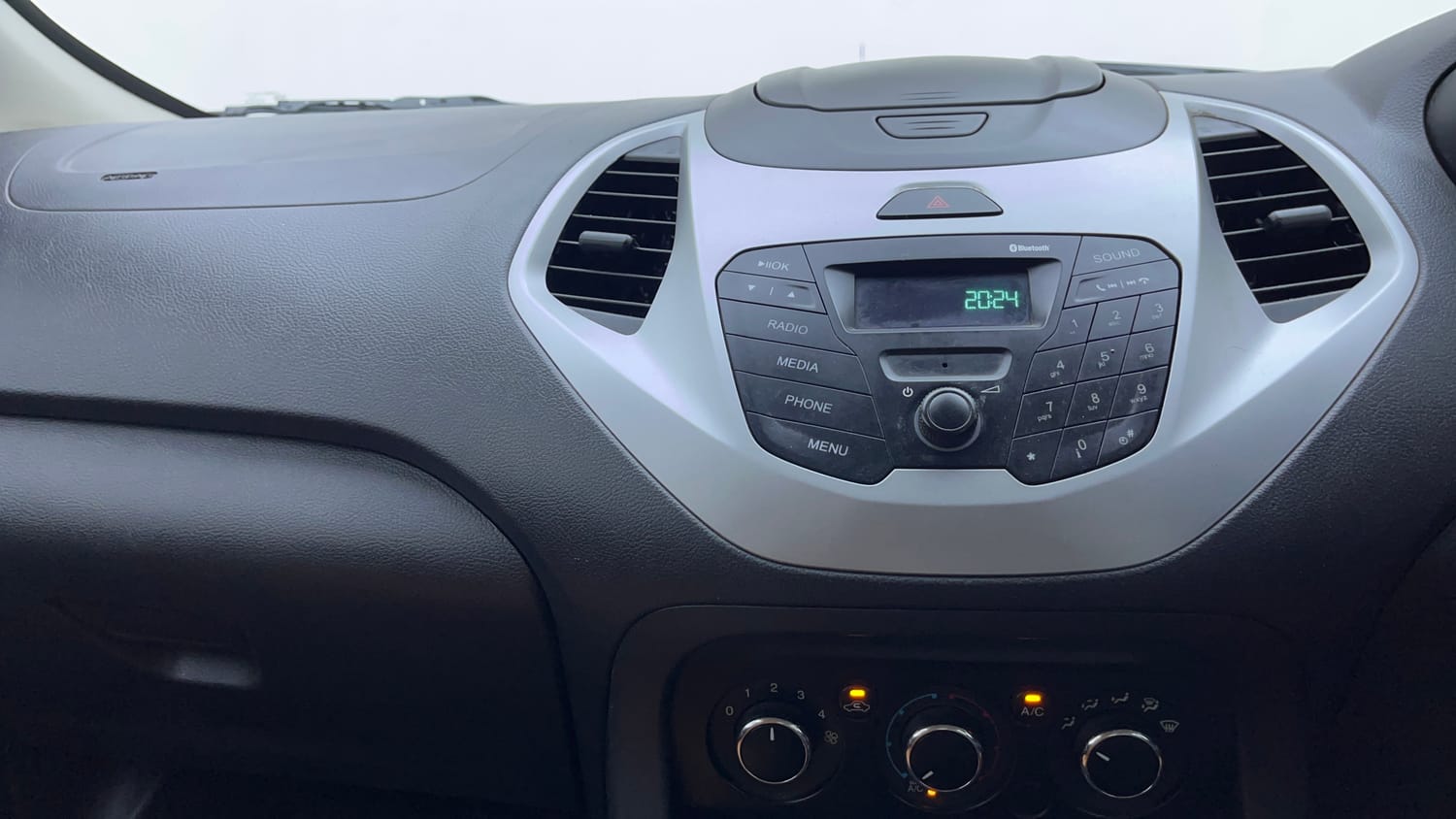 Used 2017 Ford Figo Trend 1.2 Ti-VCT Petrol Manual interior MUSIC SYSTEM & AC CONTROL VIEW