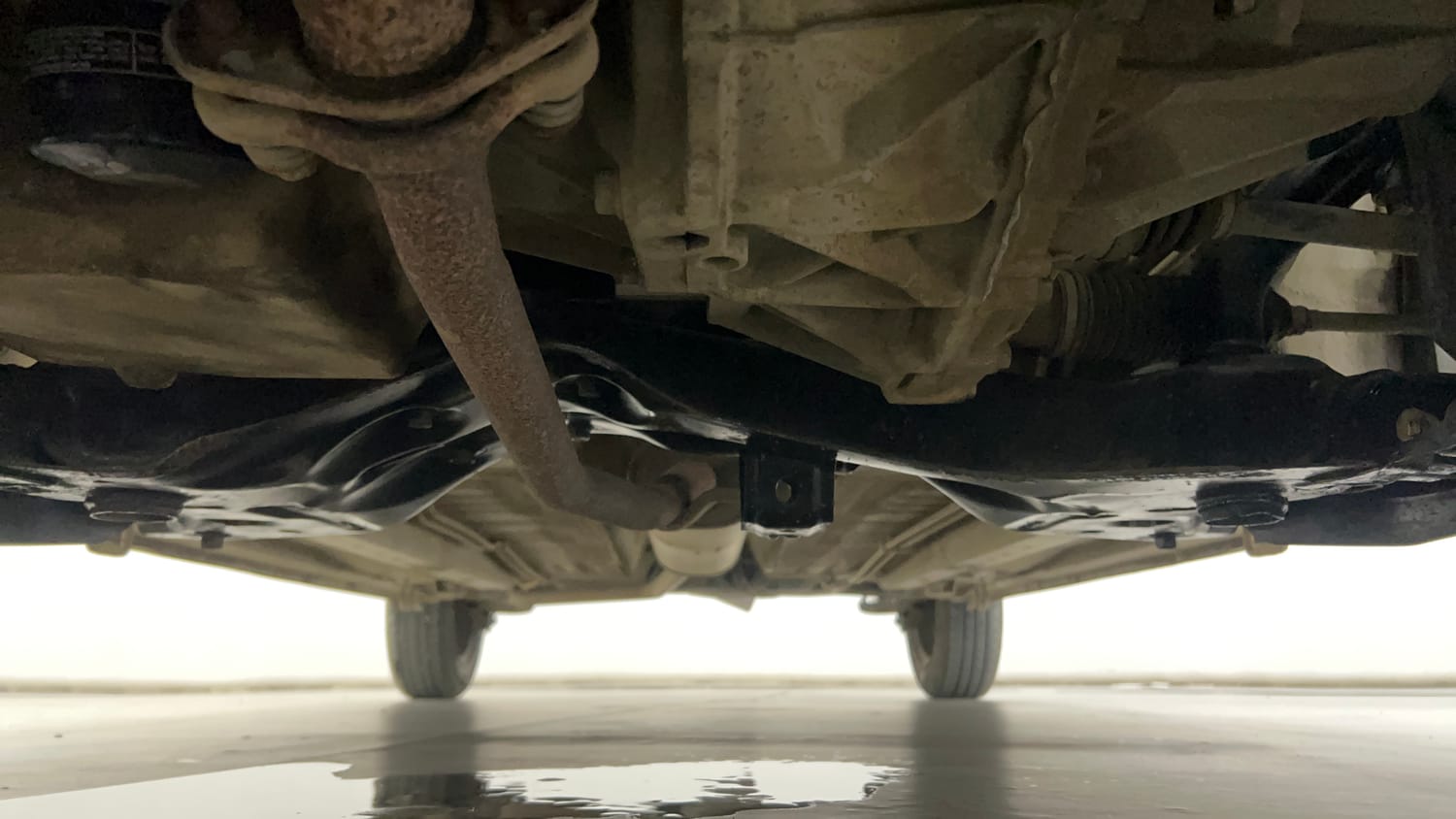 Used 2015 Maruti Suzuki Celerio VXi AMT Petrol Automatic extra FRONT LEFT UNDERBODY VIEW