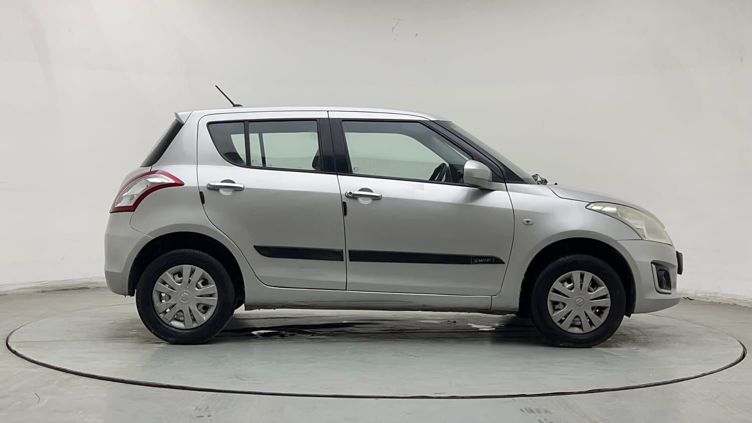 Used 2017 Maruti Suzuki Swift Lxi (O) Petrol Manual exterior RIGHT SIDE VIEW