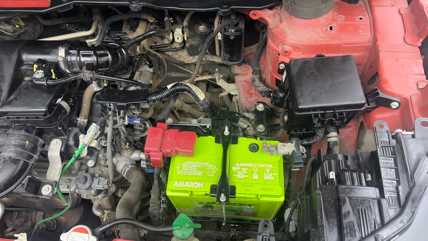 Used 2022 Maruti Suzuki Brezza Zxi Plus Dual Tone Petrol Manual engine ENGINE LEFT SIDE VIEW