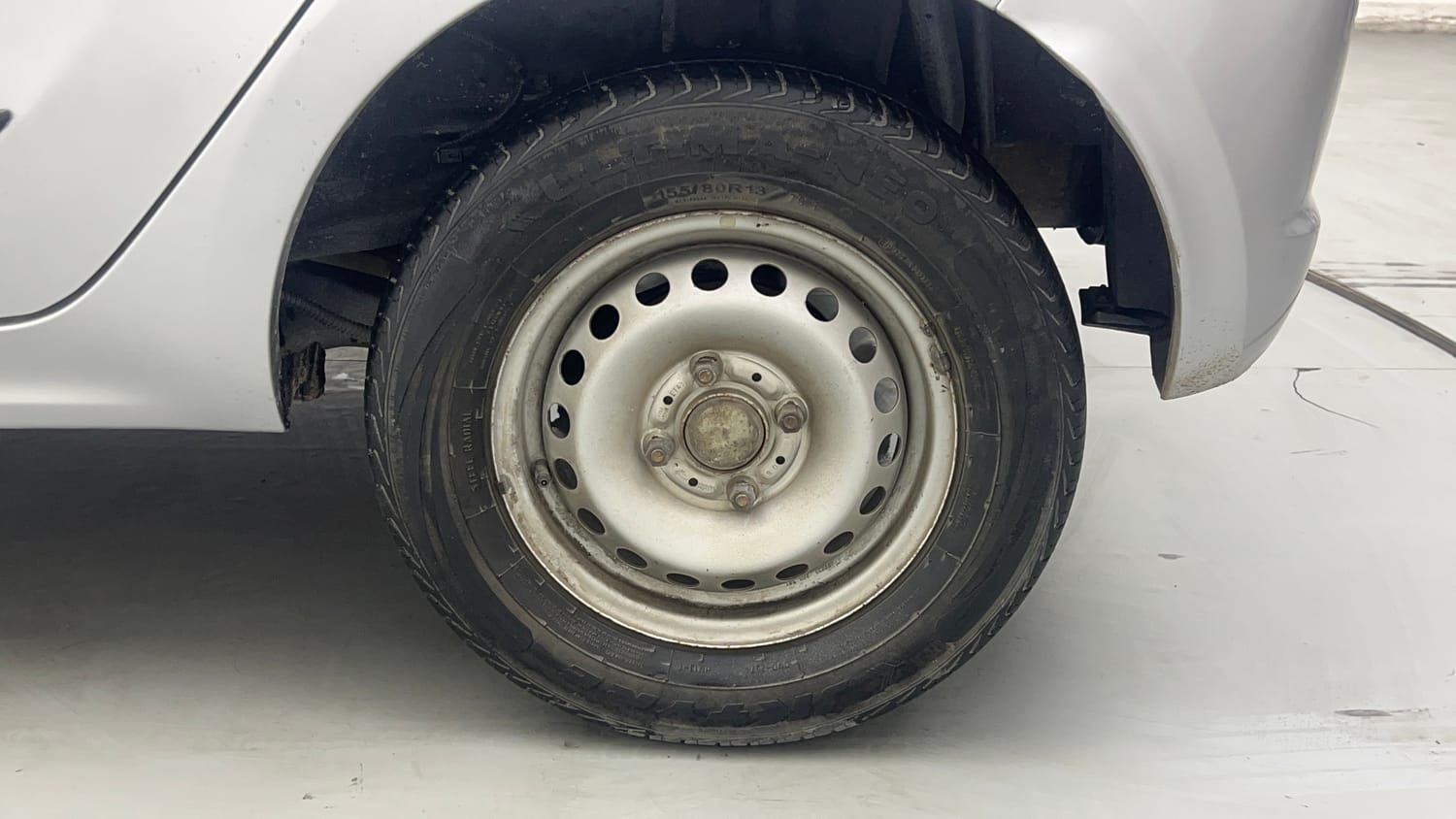 Used 2019 Tata Tiago Revotron XE Petrol Manual tyres LEFT REAR TYRE RIM VIEW