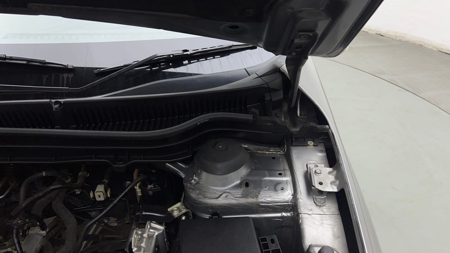 Used 2021 maruti-suzuki Vitara Brezza LXi Petrol Manual engine ENGINE LEFT SIDE HINGE & APRON VIEW
