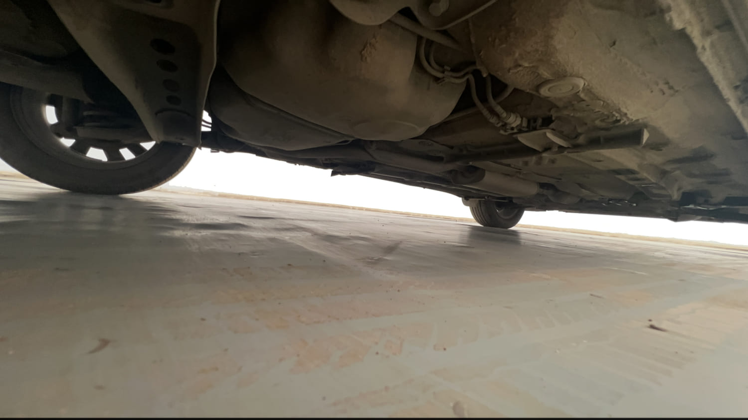 Used 2022 Volkswagen Taigun Highline 1.0 TSI AT Petrol Automatic extra REAR RIGHT UNDERBODY VIEW