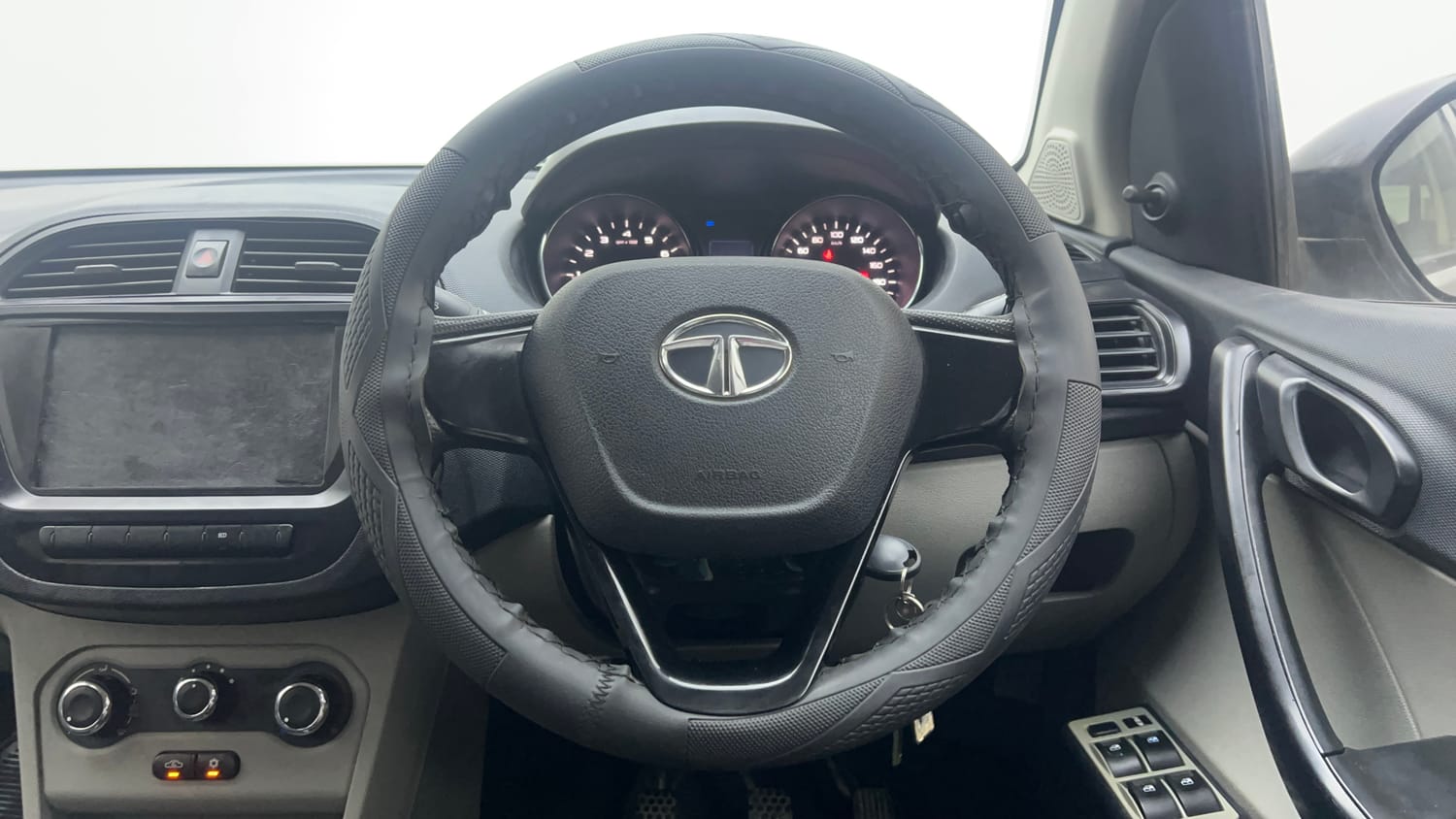Used 2019 Tata Tiago Revotron XE Petrol Manual interior STEERING VIEW