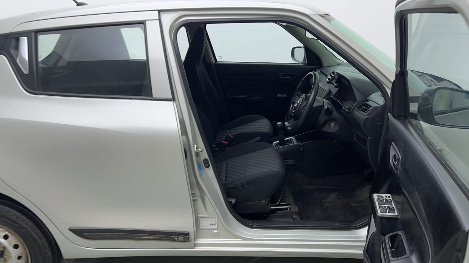 Used 2019 Maruti Suzuki Swift LXi Petrol Manual interior RIGHT SIDE FRONT DOOR CABIN VIEW