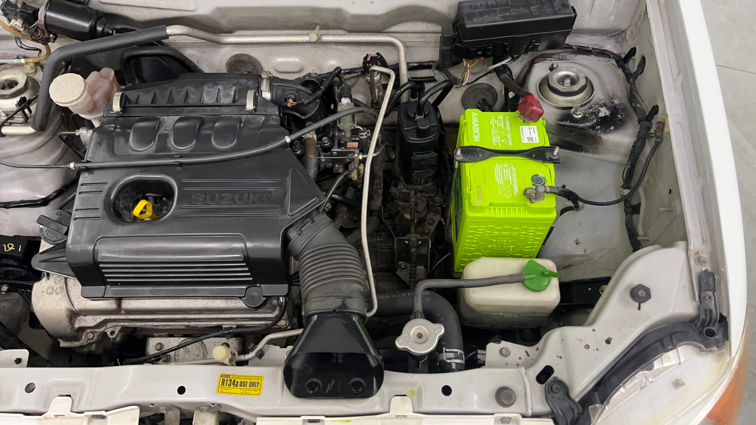 Used 2014 Maruti Suzuki Alto K10 VXi Petrol Manual engine ENGINE LEFT SIDE VIEW