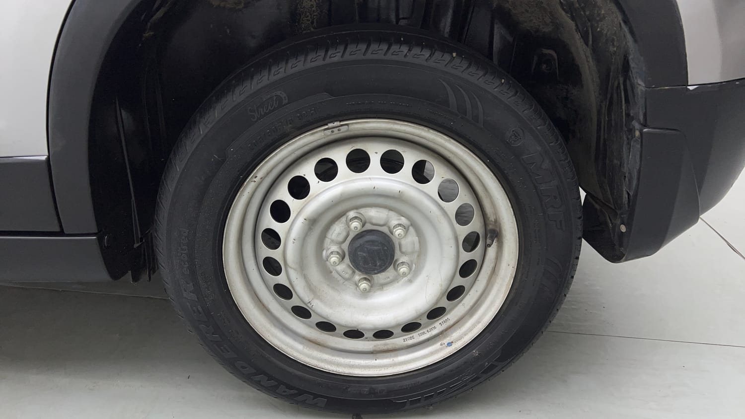 Used 2021 maruti-suzuki Vitara Brezza LXi Petrol Manual tyres LEFT REAR TYRE RIM VIEW