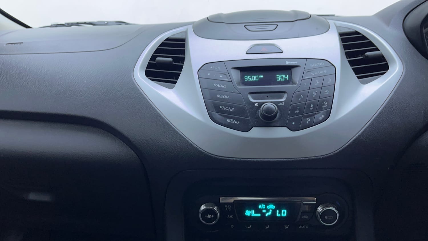 Used 2016 Ford Figo Titanium 1.2 Ti-VCT Petrol Manual interior MUSIC SYSTEM & AC CONTROL VIEW