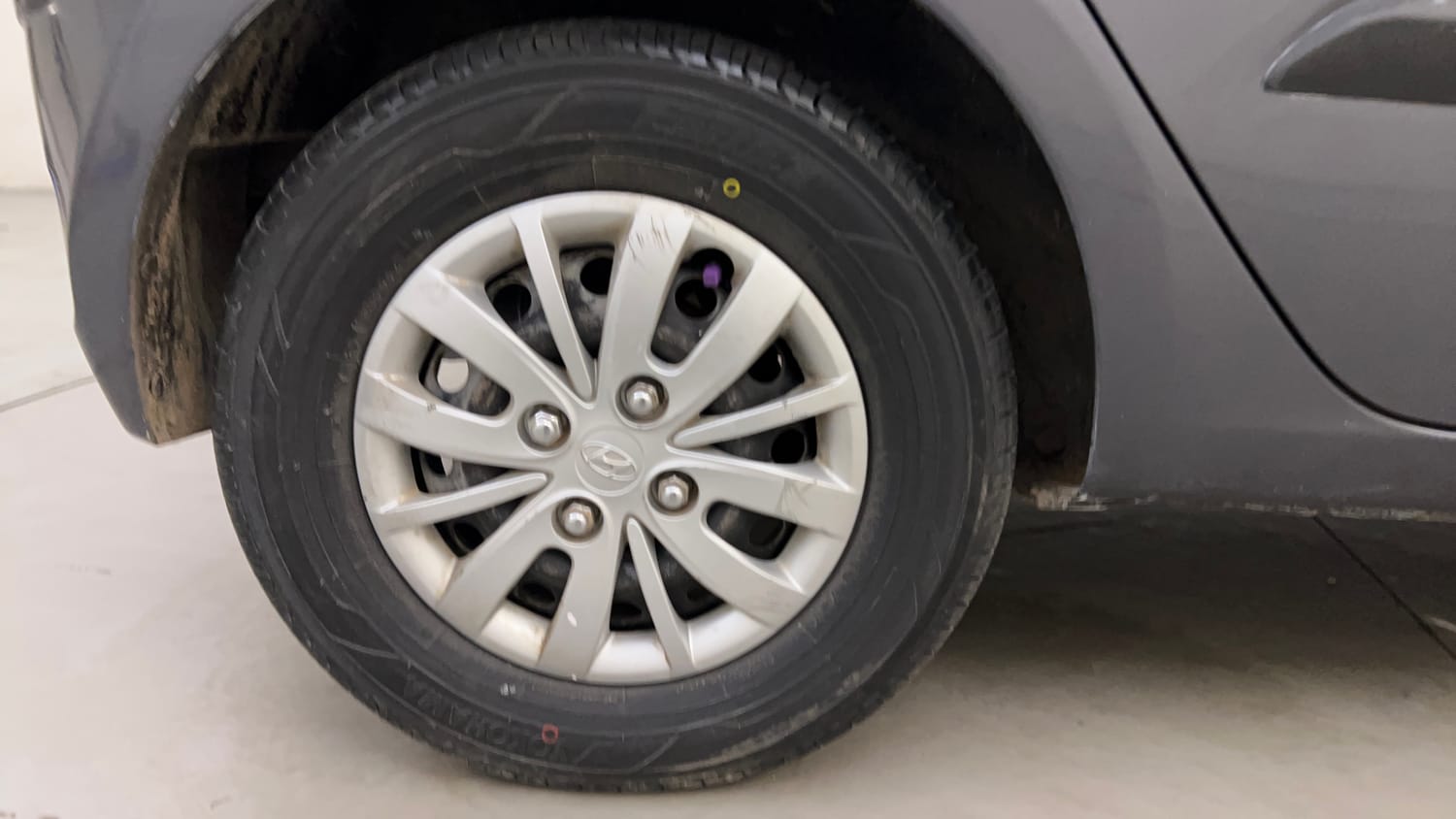 Used 2014 Hyundai i10 Sportz 1.1 iRDE2 Petrol Manual tyres RIGHT REAR TYRE RIM VIEW