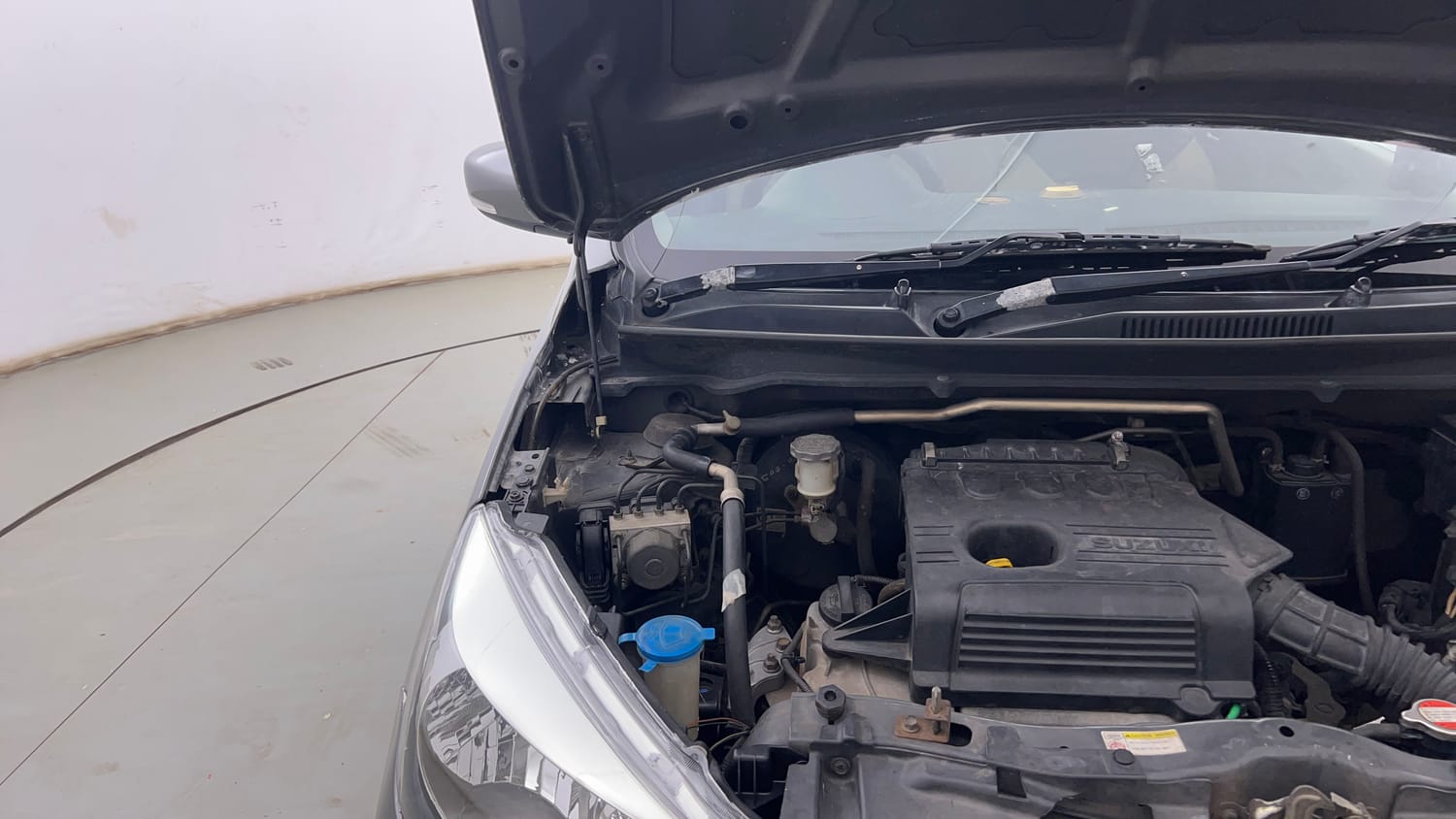 Used 2017 Maruti Suzuki Celerio ZXi Opt Petrol Manual engine ENGINE RIGHT SIDE HINGE & APRON VIEW