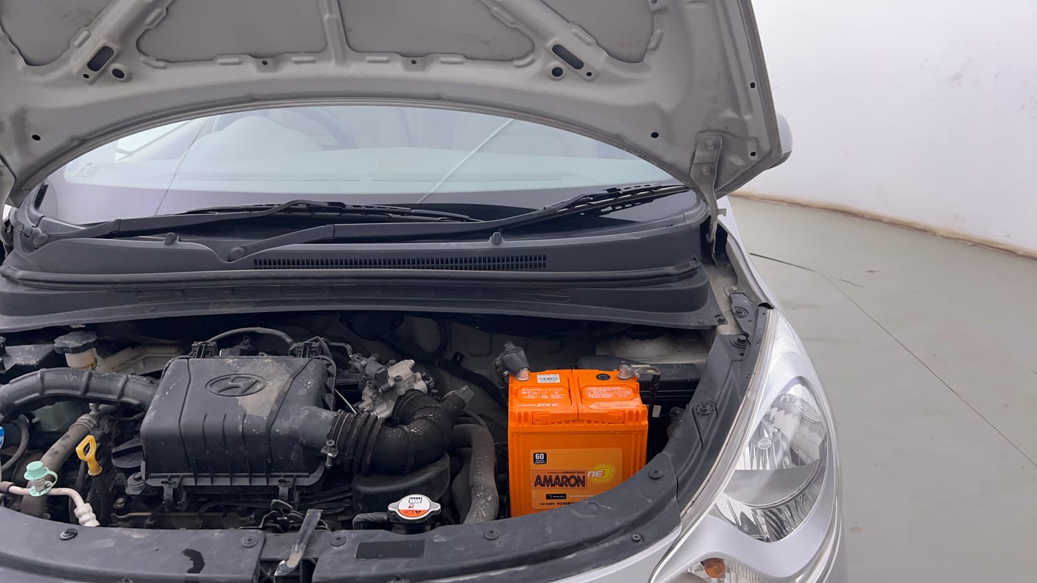 Used 2016 Hyundai i10 Sportz 1.1 iRDE2 Petrol Manual engine ENGINE LEFT SIDE HINGE & APRON VIEW