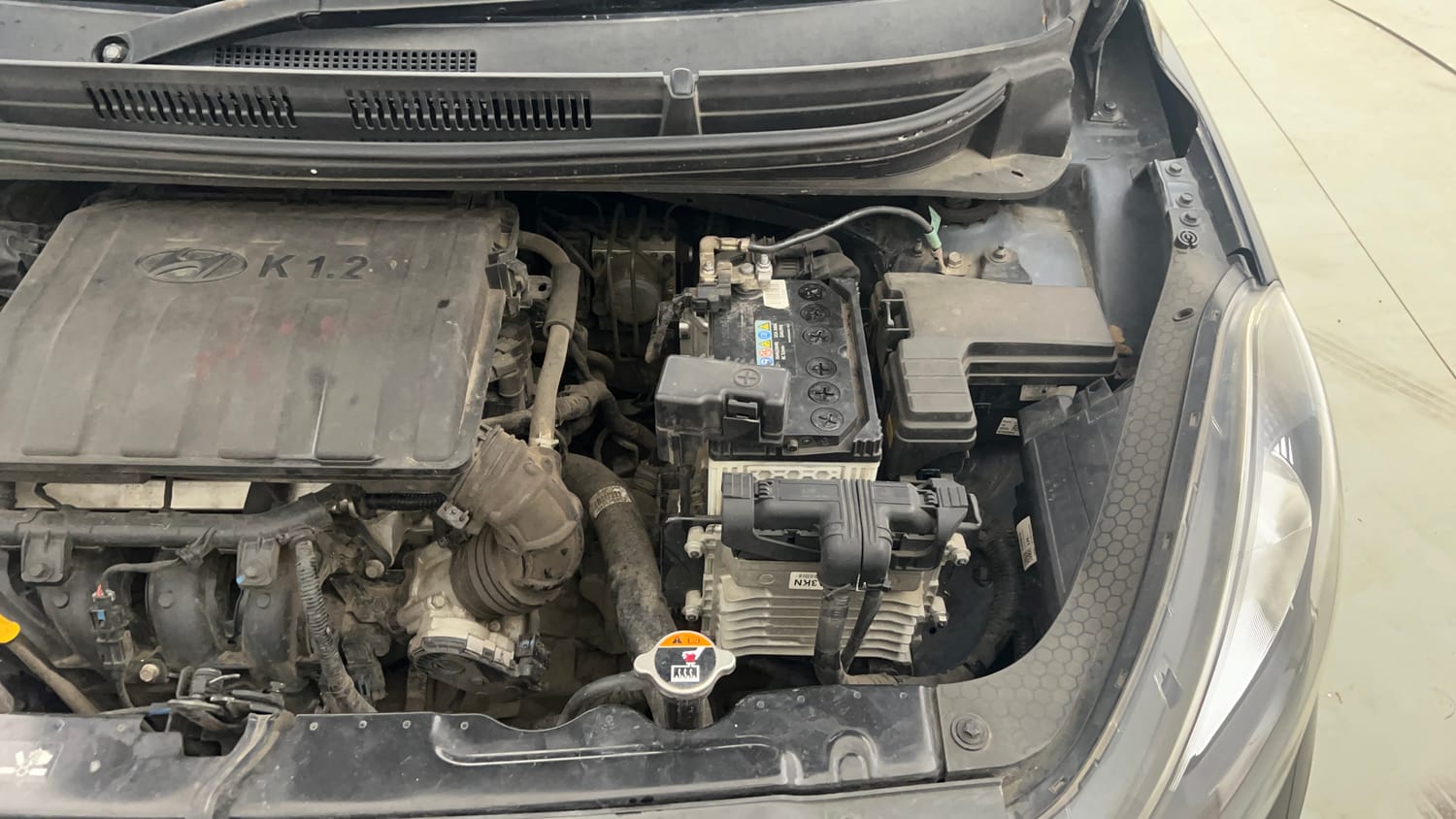 Used 2022 Hyundai Grand i10 Nios Magna AMT 1.2 Kappa VTVT Petrol Automatic engine ENGINE LEFT SIDE VIEW