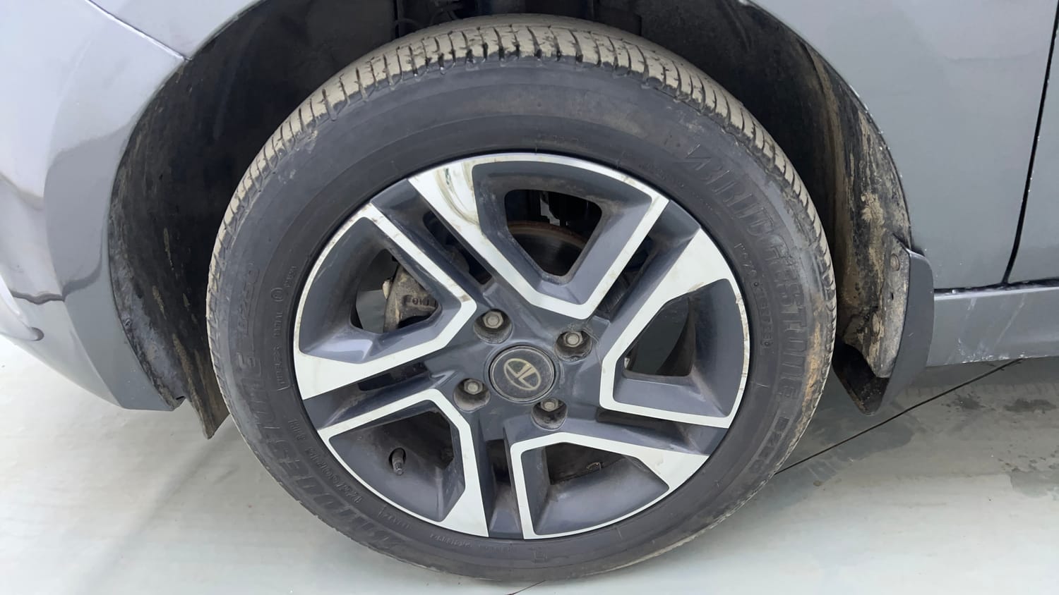 Used 2024 Tata Tiago XZ Plus Petrol Manual tyres LEFT FRONT TYRE RIM VIEW