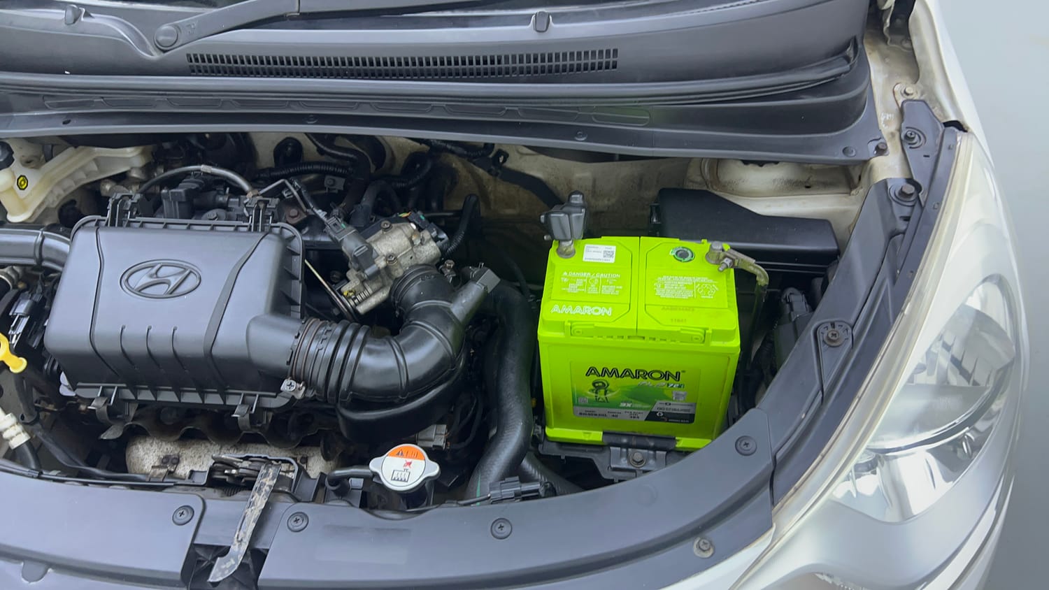 Used 2015 Hyundai i10 Sportz 1.1 iRDE2 Petrol Manual engine ENGINE LEFT SIDE VIEW