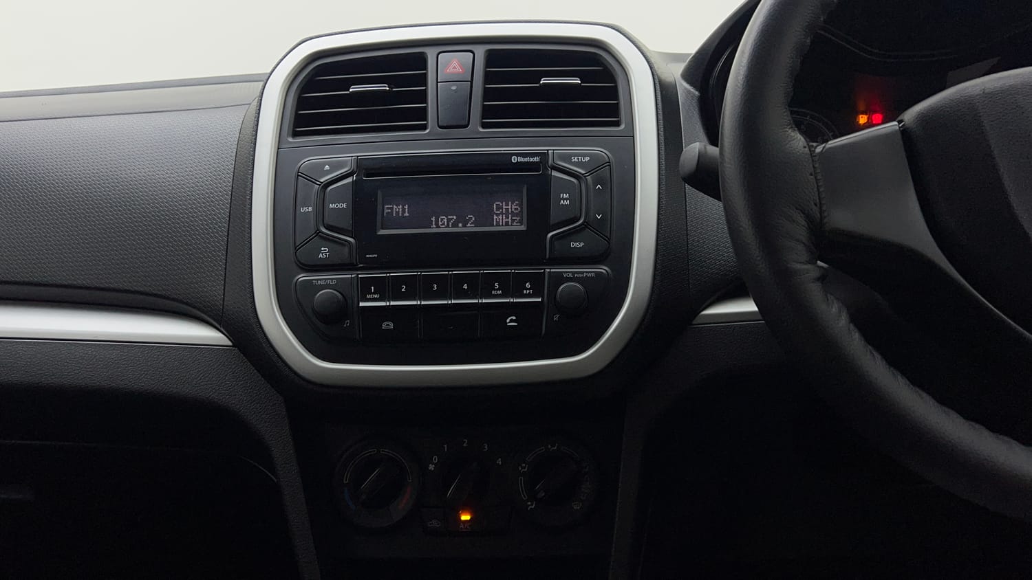 Used 2021 maruti-suzuki Vitara Brezza LXi Petrol Manual interior MUSIC SYSTEM & AC CONTROL VIEW
