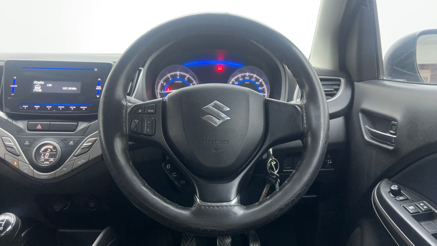 Used 2021 Maruti Suzuki Baleno Delta Petrol Manual interior STEERING VIEW