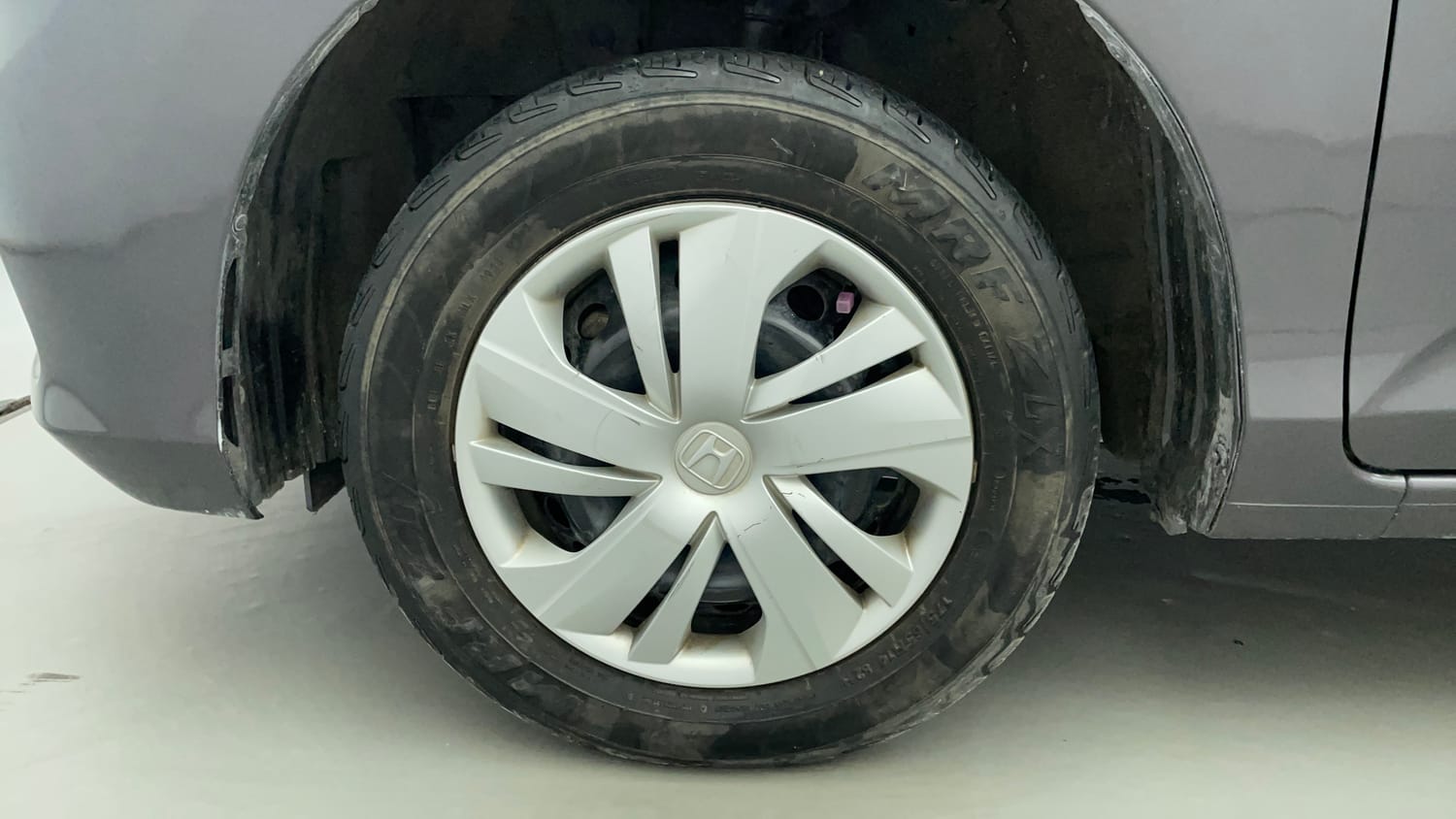 Used 2019 Honda Amaze 1.2 S MT Petrol Petrol Manual tyres LEFT FRONT TYRE RIM VIEW