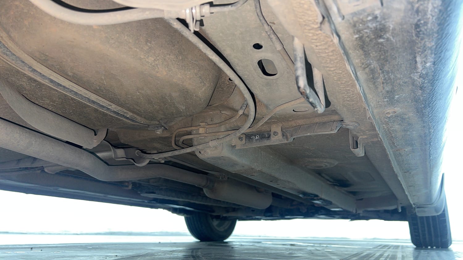 Used 2019 Maruti Suzuki Ciaz Alpha Hybrid 1.5 AT Petrol Automatic extra REAR RIGHT UNDERBODY VIEW