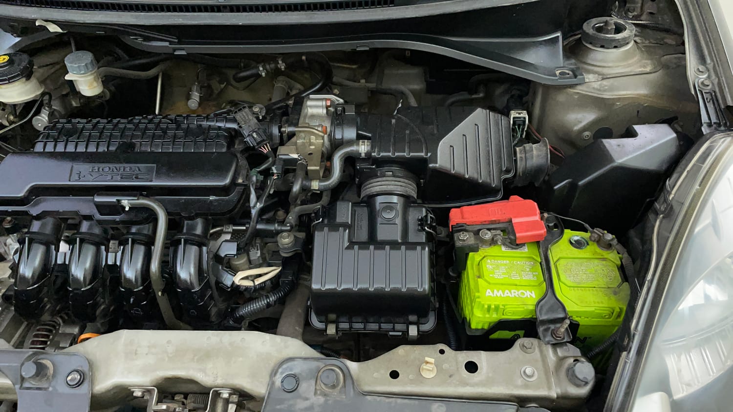 Used 2014 Honda Amaze 1.2 EX i-VTEC Petrol Manual engine ENGINE LEFT SIDE VIEW