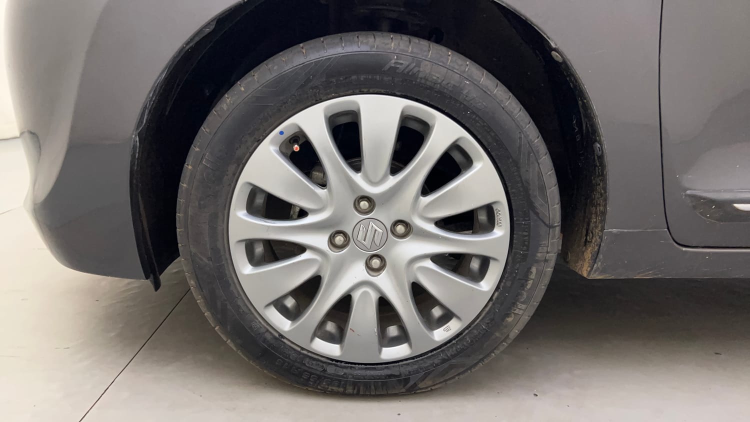 Used 2016 Maruti Suzuki Baleno Zeta 1.2 AT Petrol Automatic tyres LEFT FRONT TYRE RIM VIEW