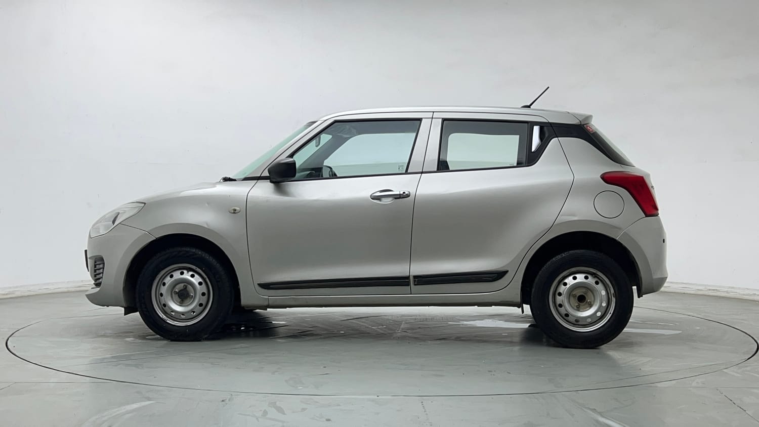 Used 2019 Maruti Suzuki Swift LXi Petrol Manual exterior LEFT SIDE VIEW