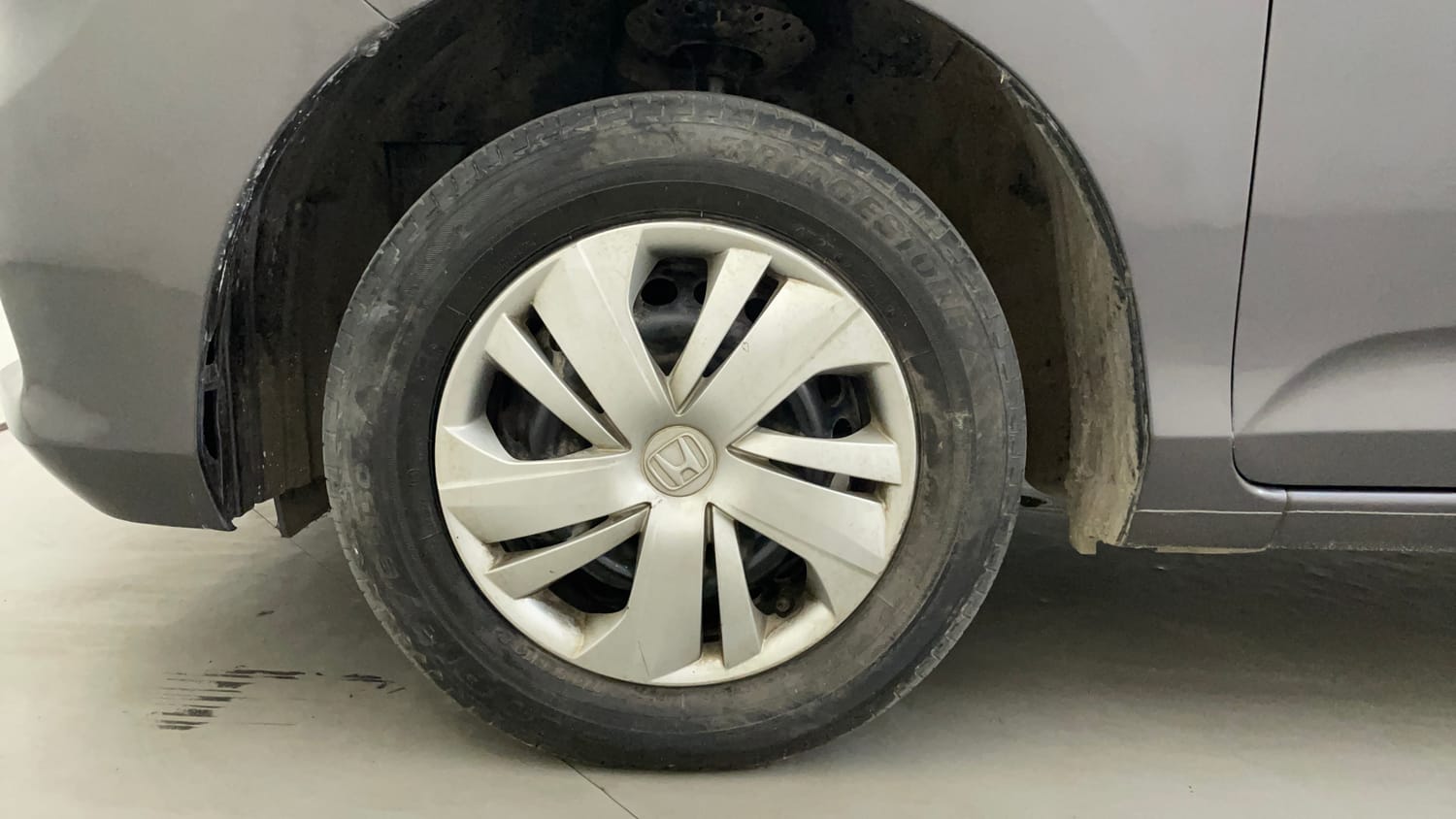 Used 2019 Honda Amaze 1.2 S MT Petrol Petrol Manual tyres LEFT FRONT TYRE RIM VIEW