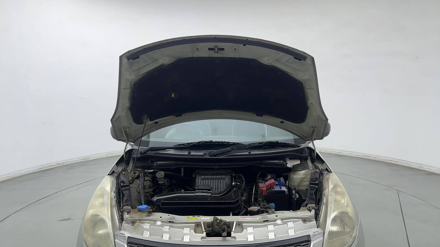 Used 2015 Maruti Suzuki Swift Lxi (O) Petrol Manual engine ENGINE & BONNET OPEN FRONT VIEW