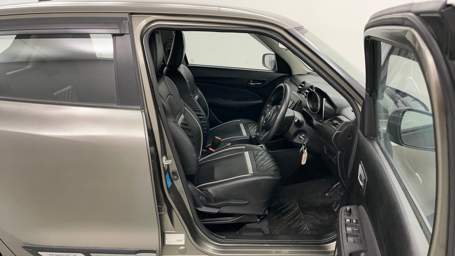 Used 2019 Maruti Suzuki Swift VXi AMT Petrol Automatic interior RIGHT SIDE FRONT DOOR CABIN VIEW