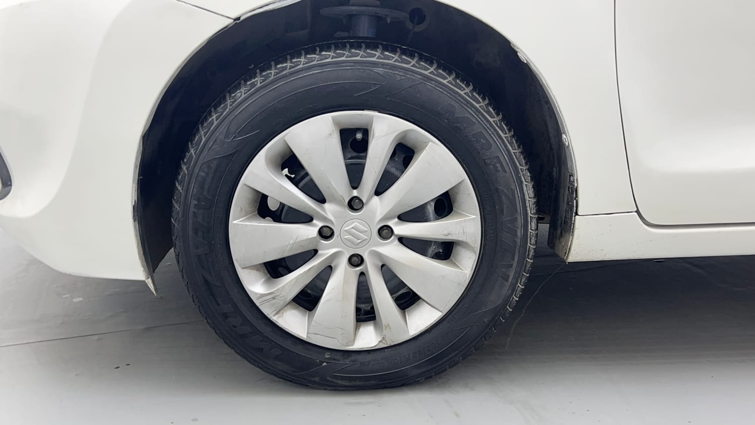 Used 2017 Maruti Suzuki Baleno Delta 1.2 Petrol Manual tyres LEFT FRONT TYRE RIM VIEW