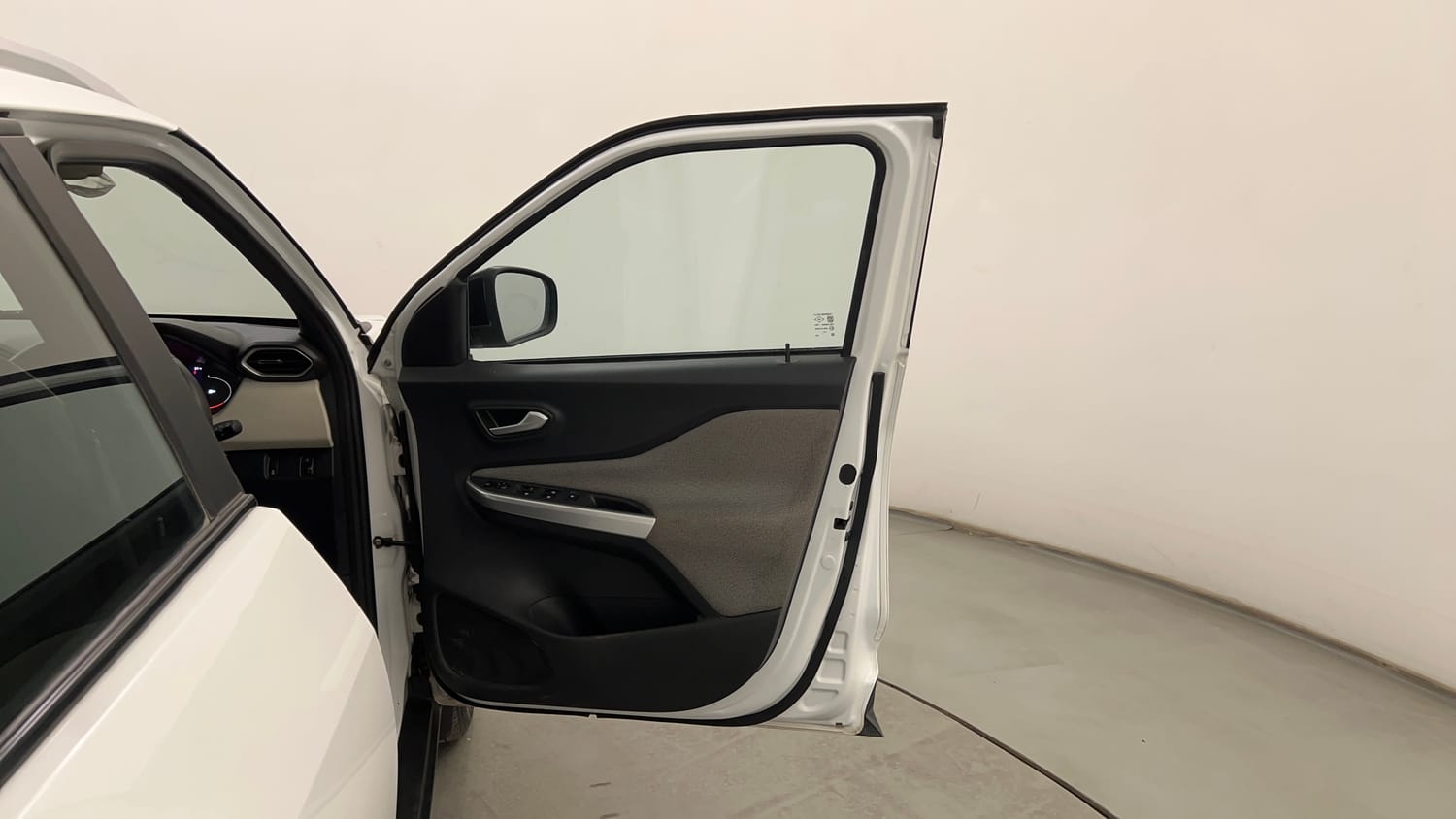 Used 2023 Nissan Magnite XV Petrol Manual interior RIGHT FRONT DOOR OPEN VIEW
